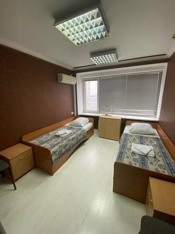 Бюджетный двухместный номер с 2 отдельными кроватями в Гостинице Волна